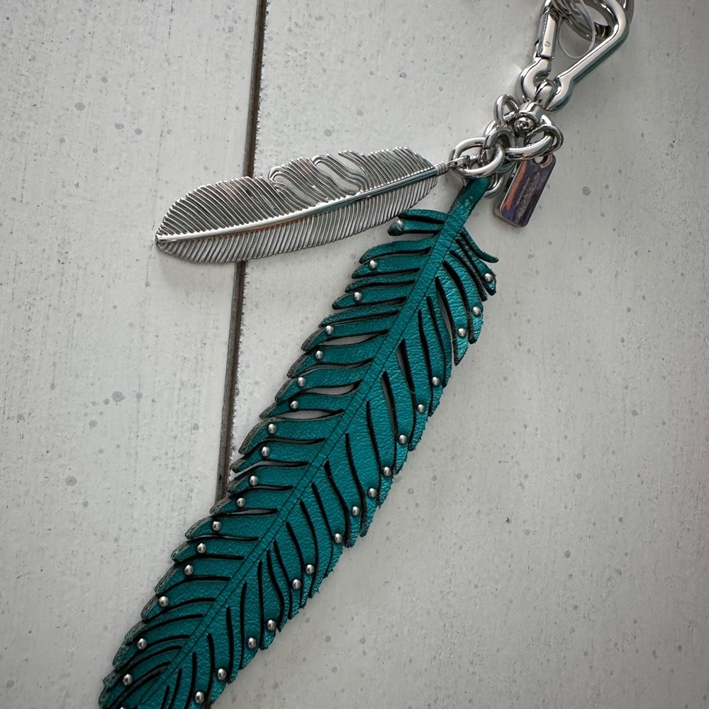 SOLD Coach Teal and Silver Feather Keychain